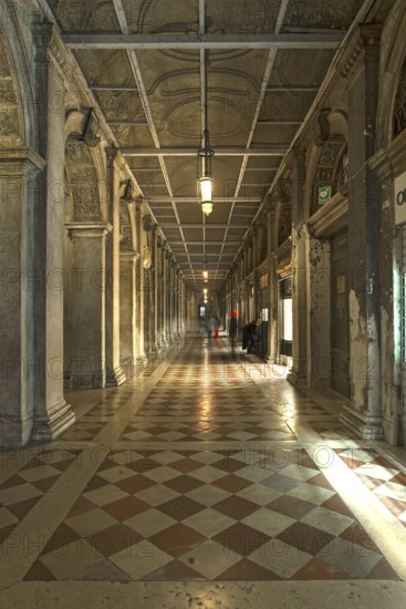 Arcade of the Procuraties in the late evening, Venice, Veneto, Italy