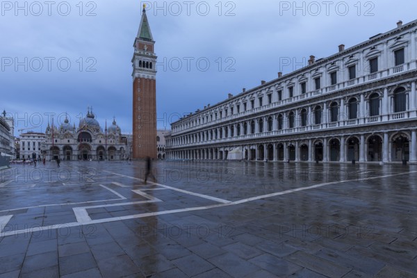 Empty St. Mark's Square with St. Mark's Basilica and St Mark's Tower early in the morning, Venice, Veneto, Italy