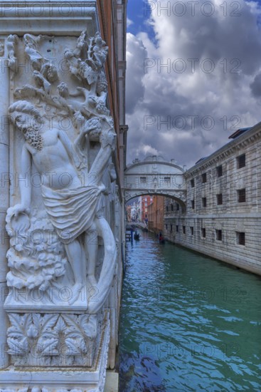 Relief of the drunken Noah at the Doge's Palace, in the back the Bridge of Sighs, Venice, Veneto, Italy