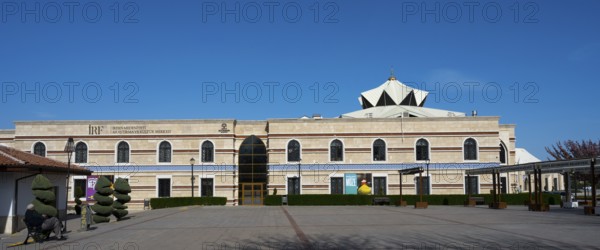 Long modern building with a flat roof and turquoise elements, Irfan Medeniyeti Arastirma ve Kültür Merkezi, Irfan Cultural Center, Konya, Central Anatolia, Turkey