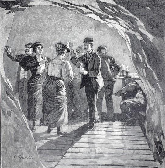 Day trippers at the source of the Tamina, river in the Swiss canton of St. Gallen, authentic, digitally restored reproduction from a 19th century model, exact date of depiction unknown, historical, people in historic clothing interact with a bar in a cave