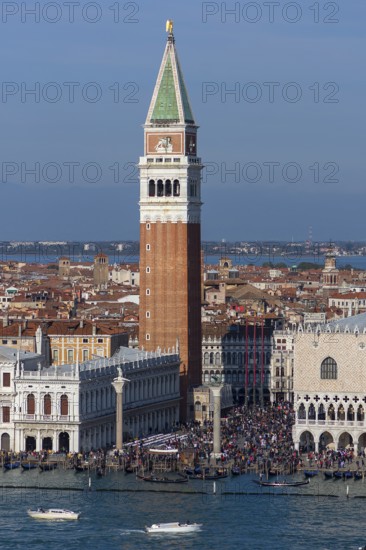 St Mark's Tower and tourists in St. Mark's Square, Venice, Veneto, Italy