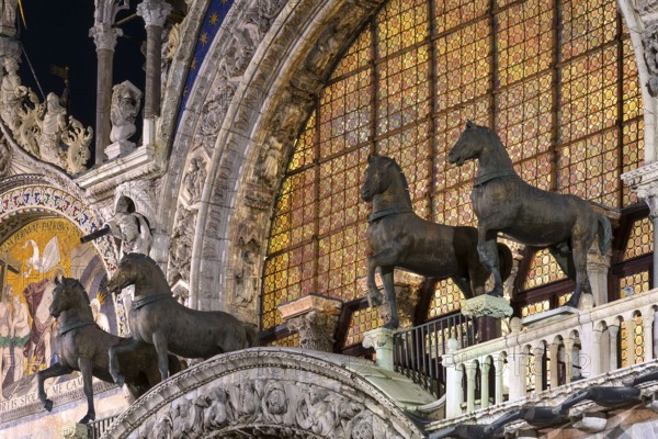 Replicas of the four life-size horse sculptures on the west portal of St. Mark's Basilica, Venice, Veneto, Italy