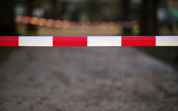 Banderole, barrier tape, red-white, blocked path, access to Tatort, Stuttgart, Baden-Württemberg, Germany