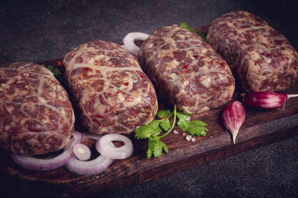 Raw apkhazura, a dish of Georgian cuisine, meat balls, minced meat wrapped in a fat net, seftalia, homemade, no people