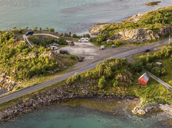 Rest area at Sommaroy Bridge, camper vans, sunset, aerial view, Norway