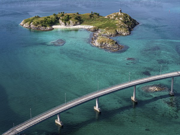 Sommaroy Bridge connecting Kvaloya Island to Sommaroy Island, small islands, turquoise water, aerial view, Norway