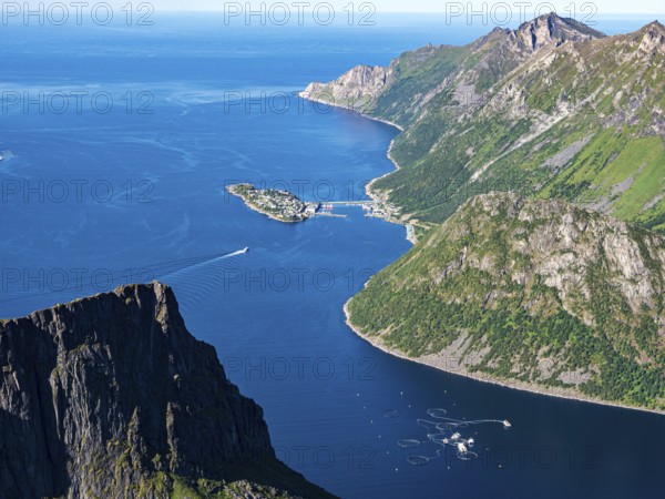 Island Husoy, fjord Ornfjorden, Senja island, Norway