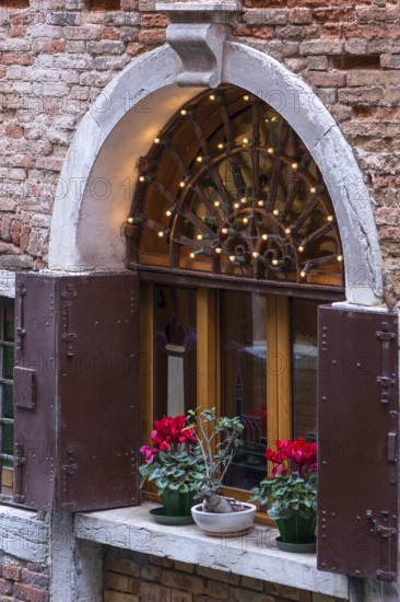 Decorative old window of a residential building, Venice, Veneto, Italy