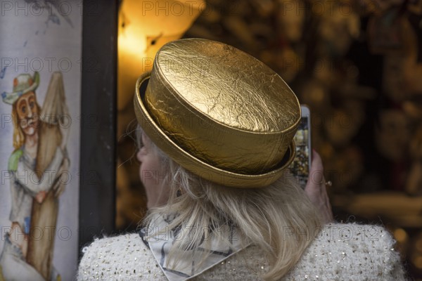 Woman wearing a golden hat, Venice, Veneto, Italy