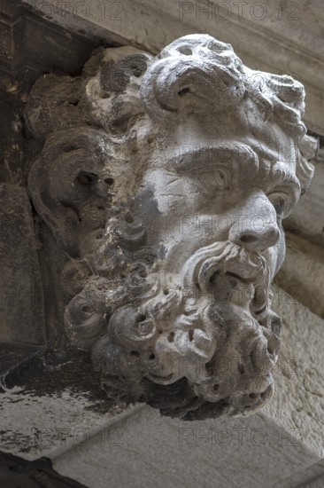 Sculpture of a man above a gate entrance, Venice, Veneto, Italy