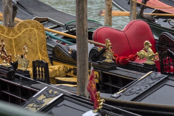 Mythological brass horse figures decorate decorative gondolas, Venice, Veneto, Italy