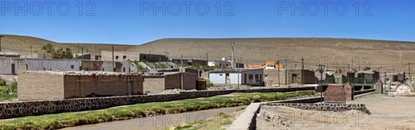 Overview of a small village in a dry and sunny hilly area, San Antonio de los Cobres, Salta Province, Argentina