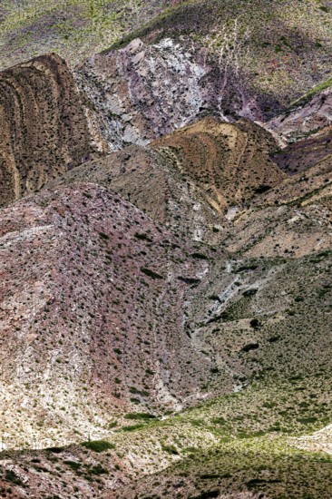 An impressive image of mountains that fascinate with their variety of colors and natural patterns, The landscape and colorful rock formations of the Quebrada de Cafayate near Salta in Argentina