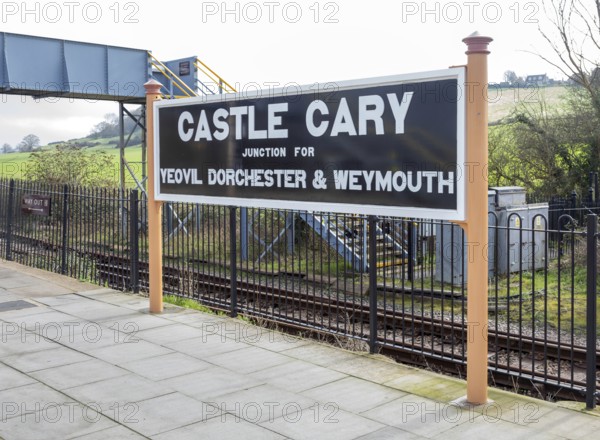 Railway station platform sign Castle Cary junction for Yeovil Dorchester and Weymouth, Castle Cary, Somerset, England, UK