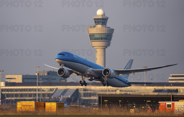 KLM Boeing 787-10 Dreamliner, aircraft taking off from Kaagbaan runway, 06/24, at Amsterdam Schiphol Airport, AMS, Air Traffic Control Tower, Netherlands