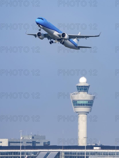 KLM aircraft takes off from Kaagbaan runway, 06/24, at Amsterdam Schiphol Airport, AMS, Air Traffic Control Tower, the Netherlands