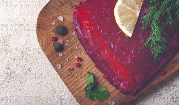 Salmon gravlax with beetroot, Scandinavian snack, beet gravlax, lightly salted fish, homemade, no people