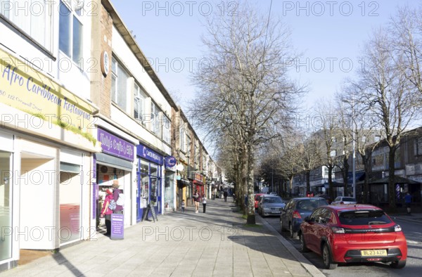 Shops and shoppers shopping street, Cornwall Street, city centre of Plymouth, Devon, England, UK