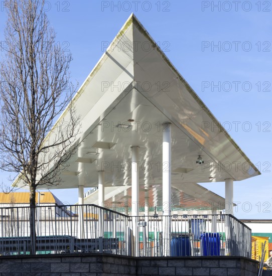 Triangular white canopy and slender columns, Plymouth bus station, Plymouth, Devon, England, UK architects Stantec