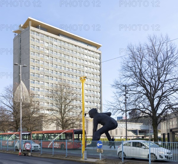 The Messenger sculpture on Royal Parade with behind the Civic Centre building built 1962 Plymouth, Devon, England, UK