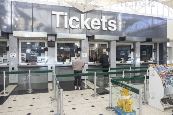 Ticket office counters Tickets area, concourse of railway station at Plymouth, Devon, England, UK