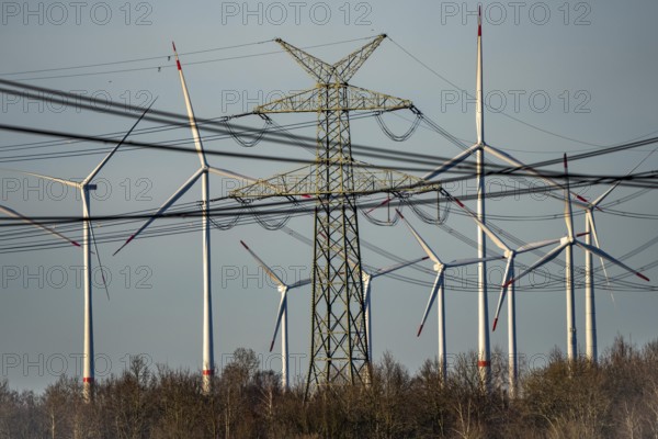 Borsum wind farm, near Rhede, on the A31 motorway, the wind farm was put into operation in 2001 and repowered in 2024, 13 old turbines were dismantled and replaced with 8 new Enercon E160 wind turbines and an Enercon E147, with a total output of almost 50 MW, high-voltage line, Lower Saxony, Germany