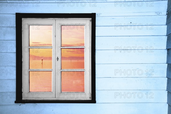 Window at a bus shelter on a steamer dock on Lake Constance, Bavaria, Baden-Württemberg, Germany