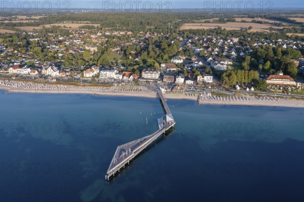 Aerial view over Seebrücke, pier and sandy beach at seaside resort Haffkrug along the Baltic Sea, Scharbeutz, Schleswig-Holstein, Germany