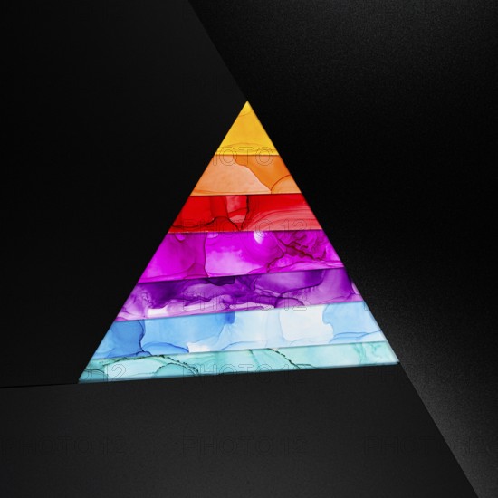 A vibrant geometric triangle featuring layers of vivid colors inks against a dark backdrop. The gradient effect and smooth textures create a striking visual contrast