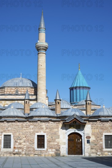 Mosque with minaret and turquoise dome under blue sky, Mevlana Museum, Mevlana, landmark, mausoleum of Mevlânâ Jalal ad-Din Rumi, Konya, Central Anatolia, Turkey