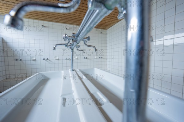 Laundry room with several taps and tile walls, modern and functional, Schlehengäu Grund Schule Gechingen, Calw district, Germany