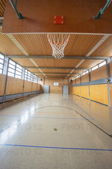 Sports hall with basketball hoop and wooden floor, ideal for various ball games, Schlehengäu Grund Schule Gechingen, Calw district, Germany