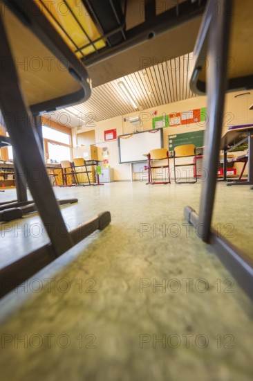 Floor view of an empty classroom, chairs in the foreground, Schlehengäu Grund Schule Gechingen, Calw district, Germany