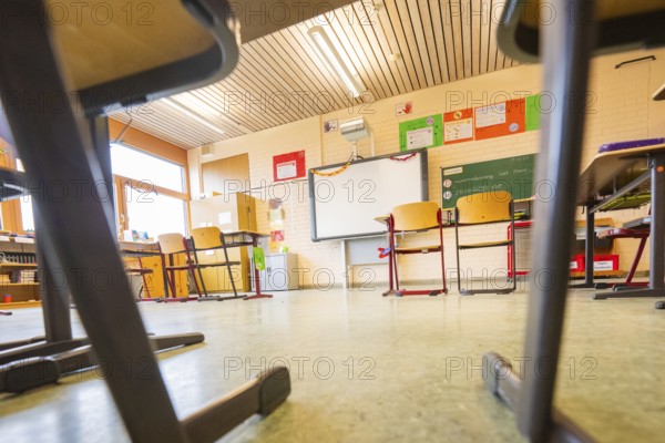An empty classroom with chairs and blackboard, inviting environment for learning, Schlehengäu Grund Schule Gechingen, Calw district, Germany
