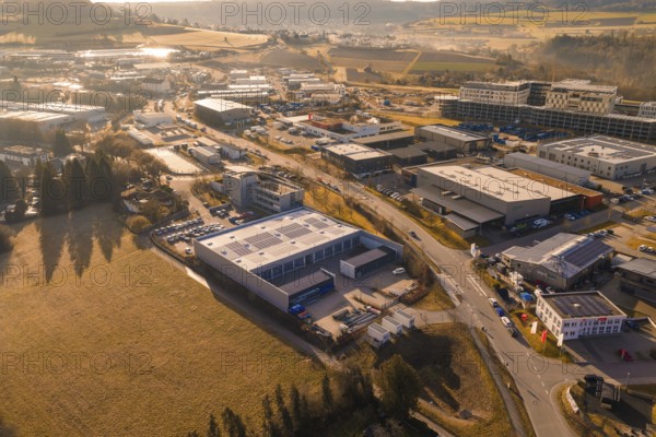Panoramic aerial view of an industrial complex surrounded by fields and roads, Calw, Calw district, Germany