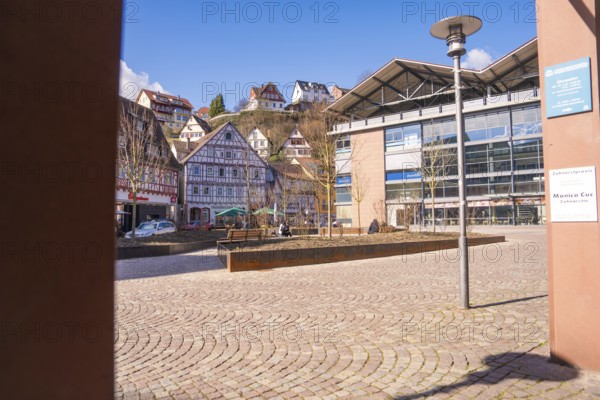 Municipal square with a combination of half-timbered and modern buildings, Calw, Calw district, Germany
