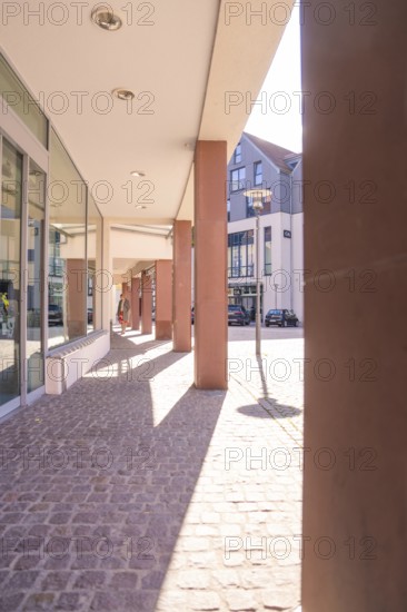 Modern urban environment with pillars and shade in bright sunshine, Calw, Calw district, Germany