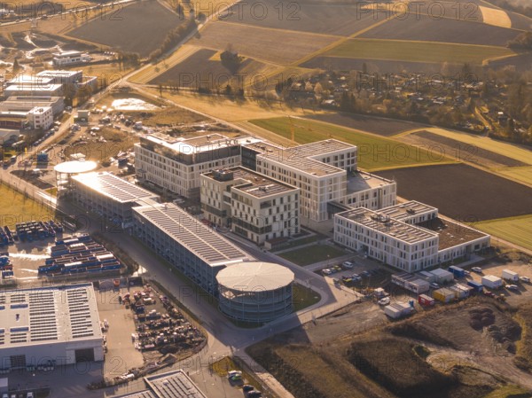 Spacious modern building complexes on the outskirts of a city surrounded by fields, new hospital on the Calw health campus, Calw district, Germany