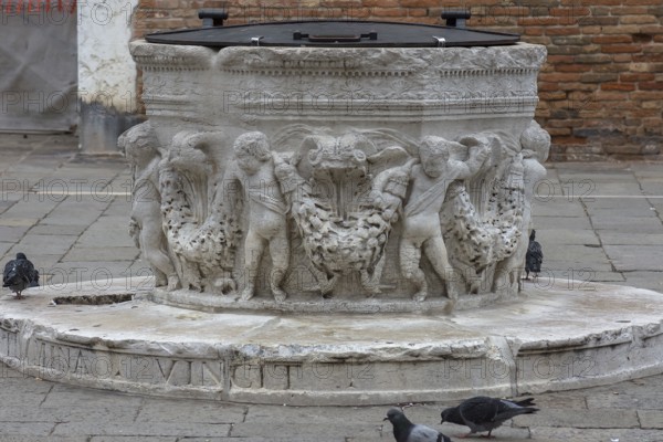 Old closed fountain in a square, Venice, Veneto, Italy