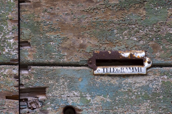 Letter box for telegrams on an old door, Venice, Veneto, Italy