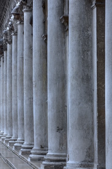 Historic Columns with Sculptures, Arcade of the Procuraties, Venice, Veneto, Italy