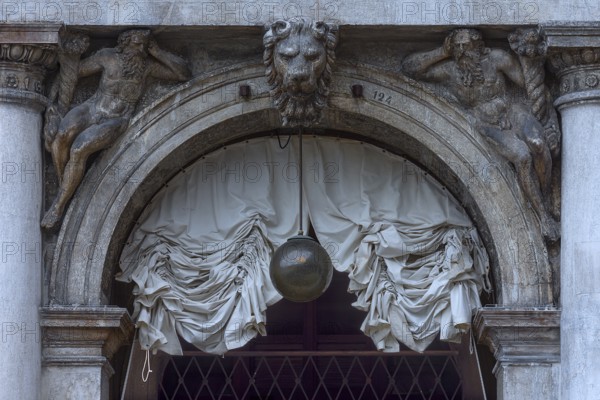 Detail with sculptures from the historic arcade of the authorized signatories, Venice, Veneto, Italy