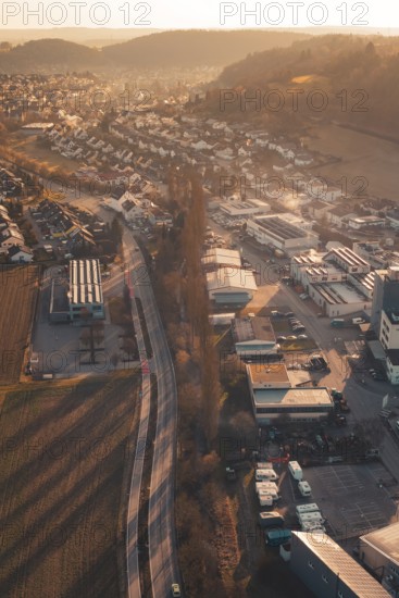 Industrial Landscape at Twilight with Roads and Houses nestled in Hilly Terrain, Aidlingen, Böblingen District, Germany