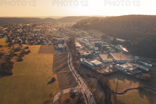 Aerial view of urban and industrial areas transitioning into countryside, Aidlingen, Böblingen District, Germany
