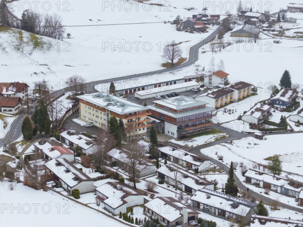 Snowy village with views of roofs and roads from above, specialist clinic for psychosomatics and psychotherapy, Hochgrat Clinic, Stiefenhofen, Bavaria, Germany