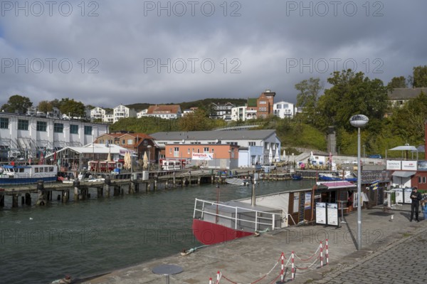 Fishing boats and fish shops at the city harbor, Sassnitz, Rügen, island, Baltic Sea, Mecklenburg-Western Pomerania, Germany
