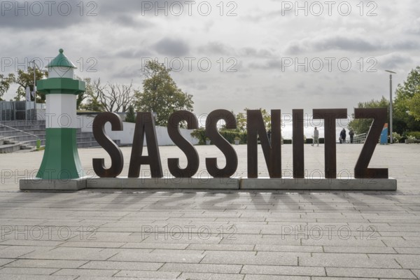 The word Sassnitz, written with capital letters with a replica of the lighthouse, Sassnitz, Rügen, Insel, Ostsee, Mecklenburg-Western Pomerania, Germany