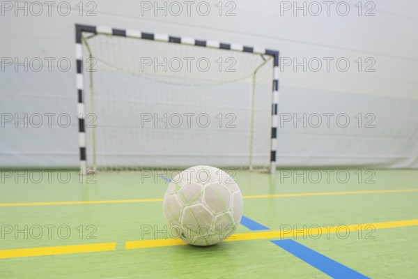A handball on a yellow stripe in front of a goal on a pitch, handball, Calw, Germany