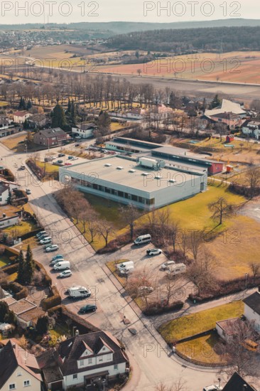 Aerial view of a village with buildings and trees surrounded by fields, Ötisheim, Enzkreis, Germany